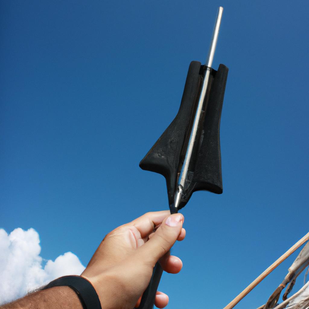 Person holding folded antenna device