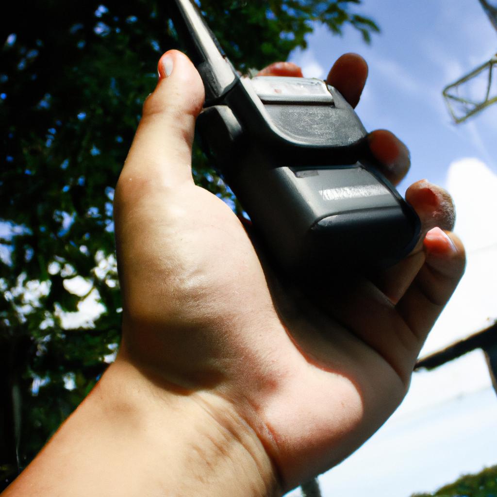 Person holding a radio transmitter