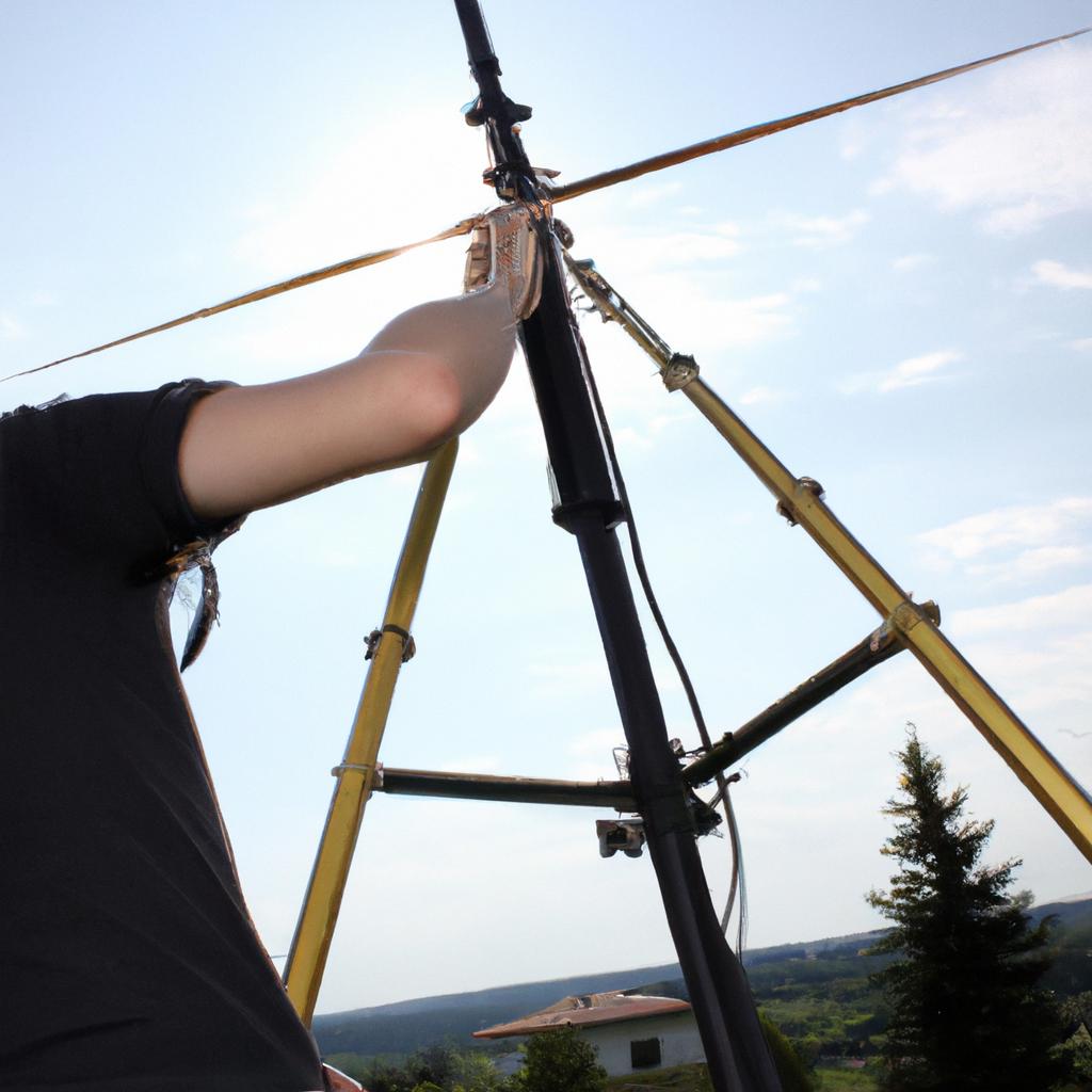 Person adjusting telescopic radio antenna