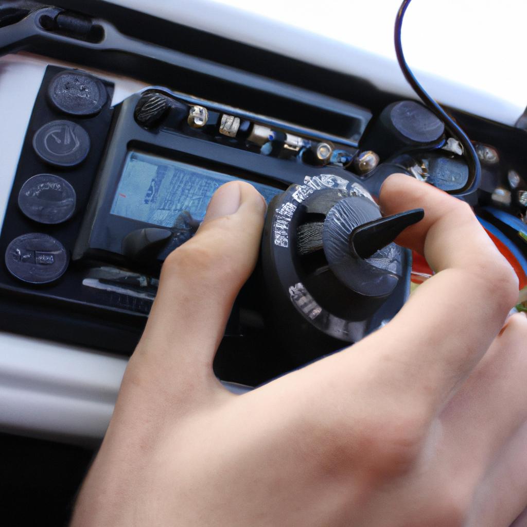 Person adjusting radio frequency settings